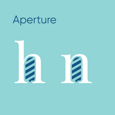 A professional typography diagram illustrating the aperture anatomy of a typeface using the letters h and n