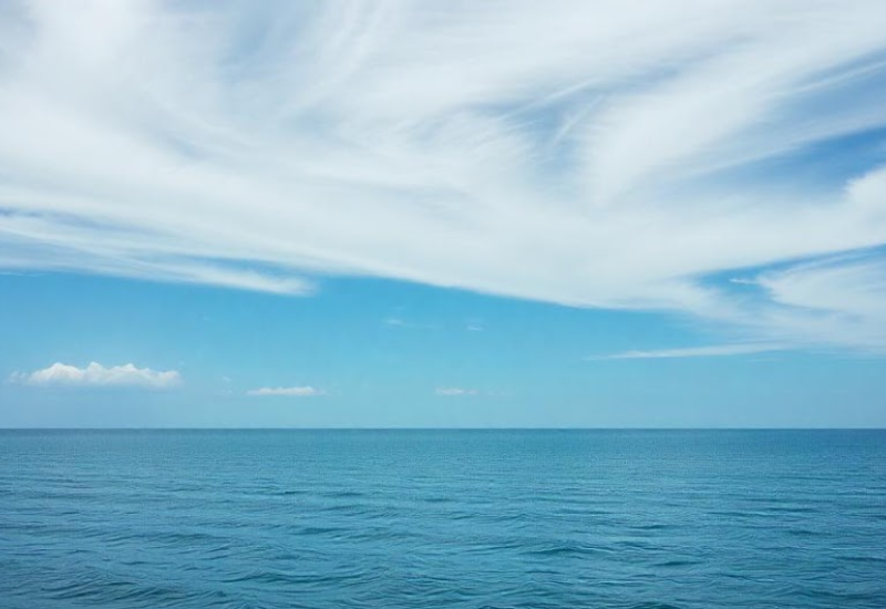 A professional landscape photograph illustrating horizontal lines as a design element to convey stability and calm