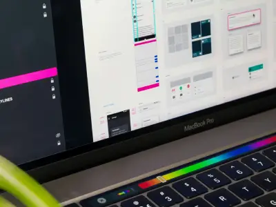 close up shot of a ui/ux designer laptop showcasing a ui/ux design in figma software