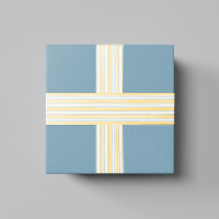 A professional duct tape mockup on a blue gift box featuring a custom yellow striped pattern design