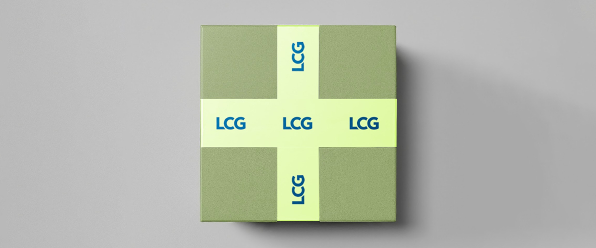 A top-down view of a green square box sealed with lime green branded duct tape mockup freebie
