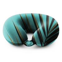 A professional travel neck pillow mockup featuring a tropical palm leaf pattern design for creative lifestyle branding